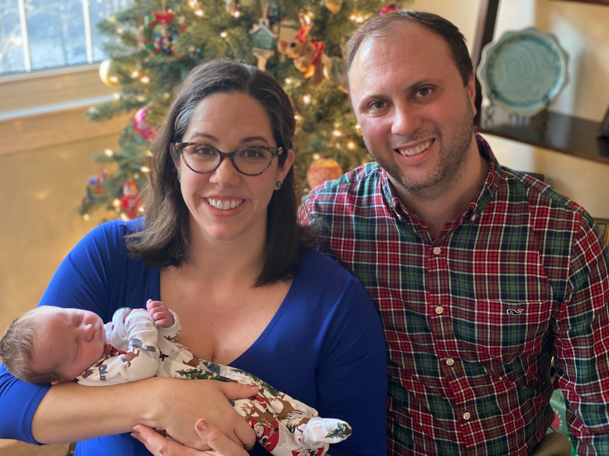 Dr. Griffin with his wife and baby.