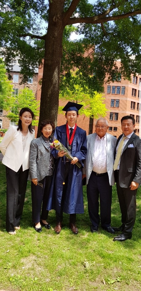 Kim family at graduation of Russell Kim '18