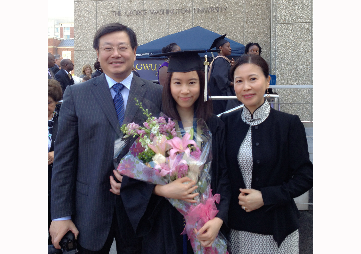 GW parents Jian Zhang and Min Shi and their daughter Isabella Zhang, GWSB B.Accy ’14