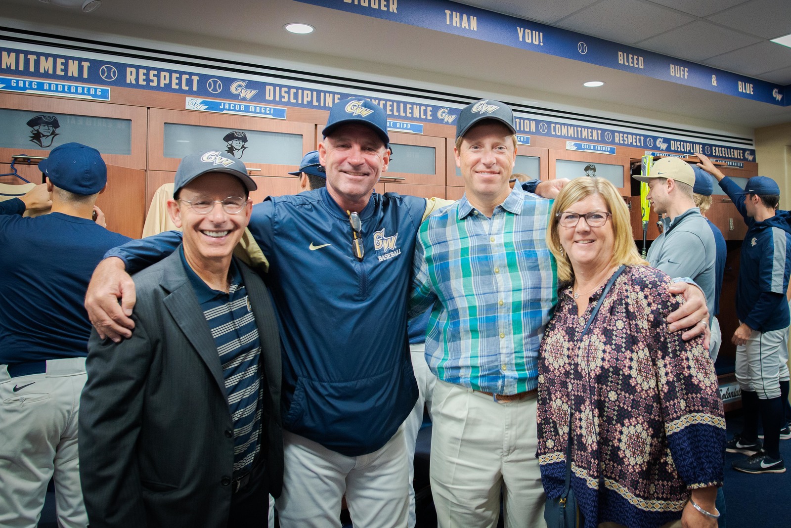 Ave Tucker, BBA '77, Coach Ritchie, and parents Dave and Tam Fassnacht P '20