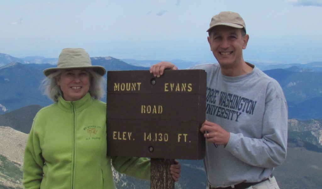 Taking GW to the top: Jerry Tinianow, BA ’77, JD ’80, wears his GW pride at the summit of Mt. Evans with his wife, Sharon.