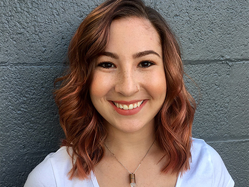 Riley Ritchie, Class of 2020, a smiling volunteer with GW Hillel.